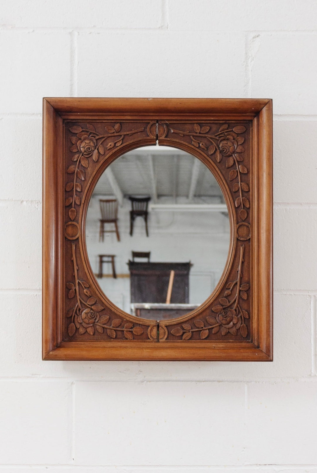 antique French Black Forest style carved walnut spindel mirror