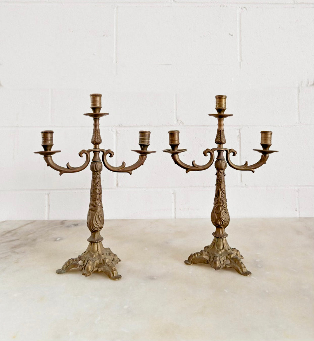 pair of vintage french cast metal candelabras