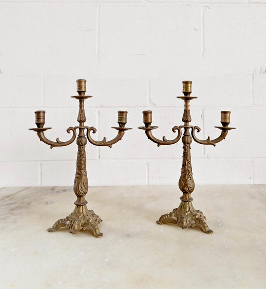 pair of vintage french cast metal candelabras