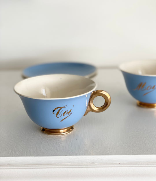antique french "toi et moi" gold and cerulean teacups and saucers