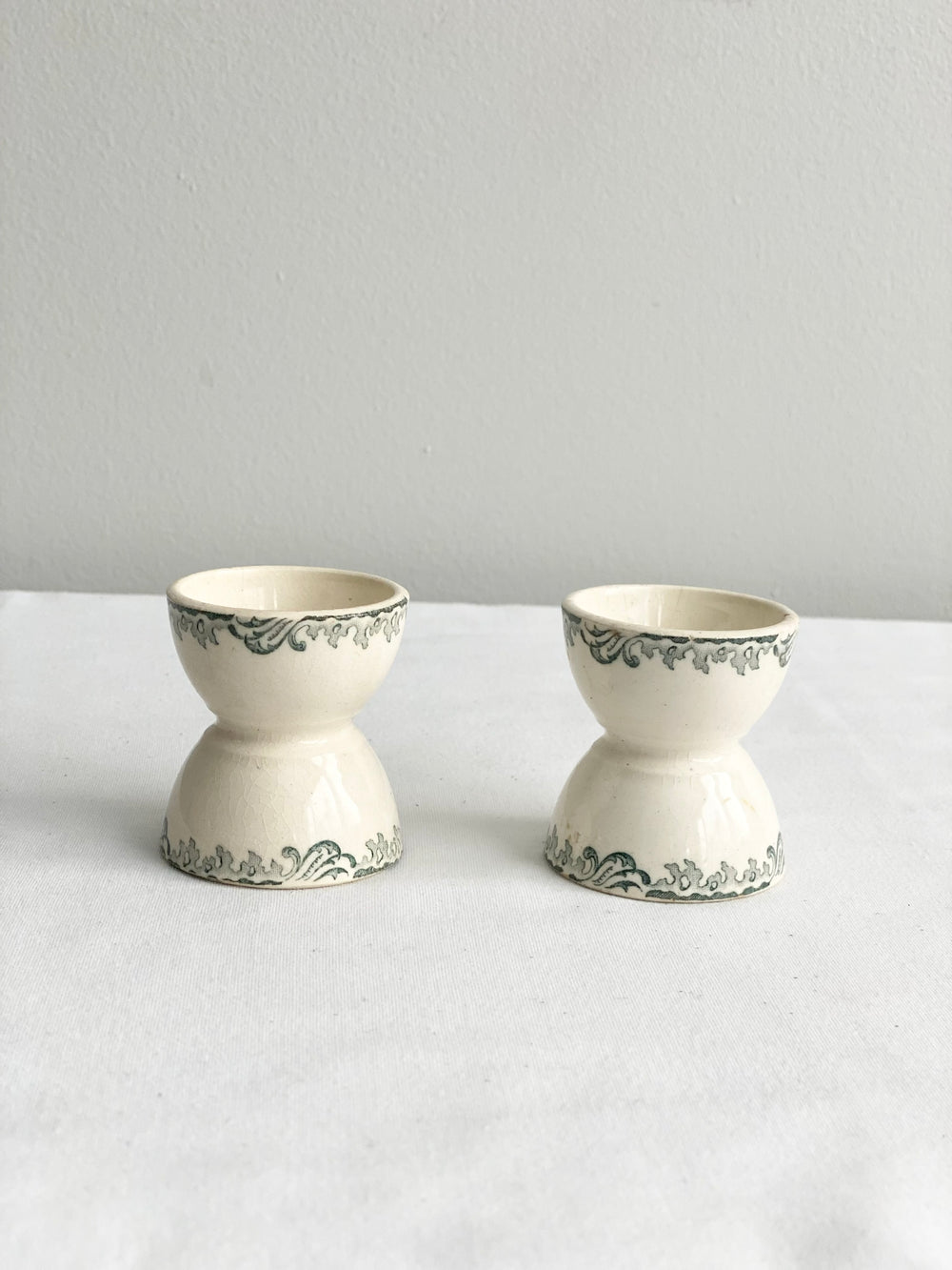 antique French porcelain transferware egg cups, set of two