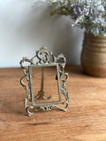 pair of vintage French petite brass picture frames