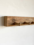 primitive carved wood coat rack, raw