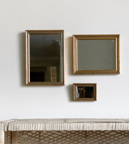 trio of vintage mirrors